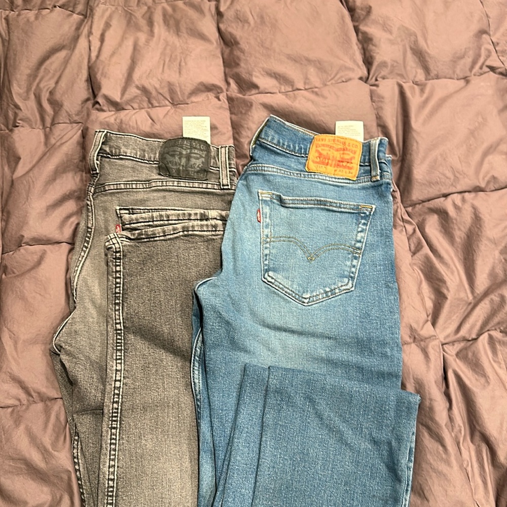 Levi’s jeans men’s excellent condition. One grey/black one blue jean
